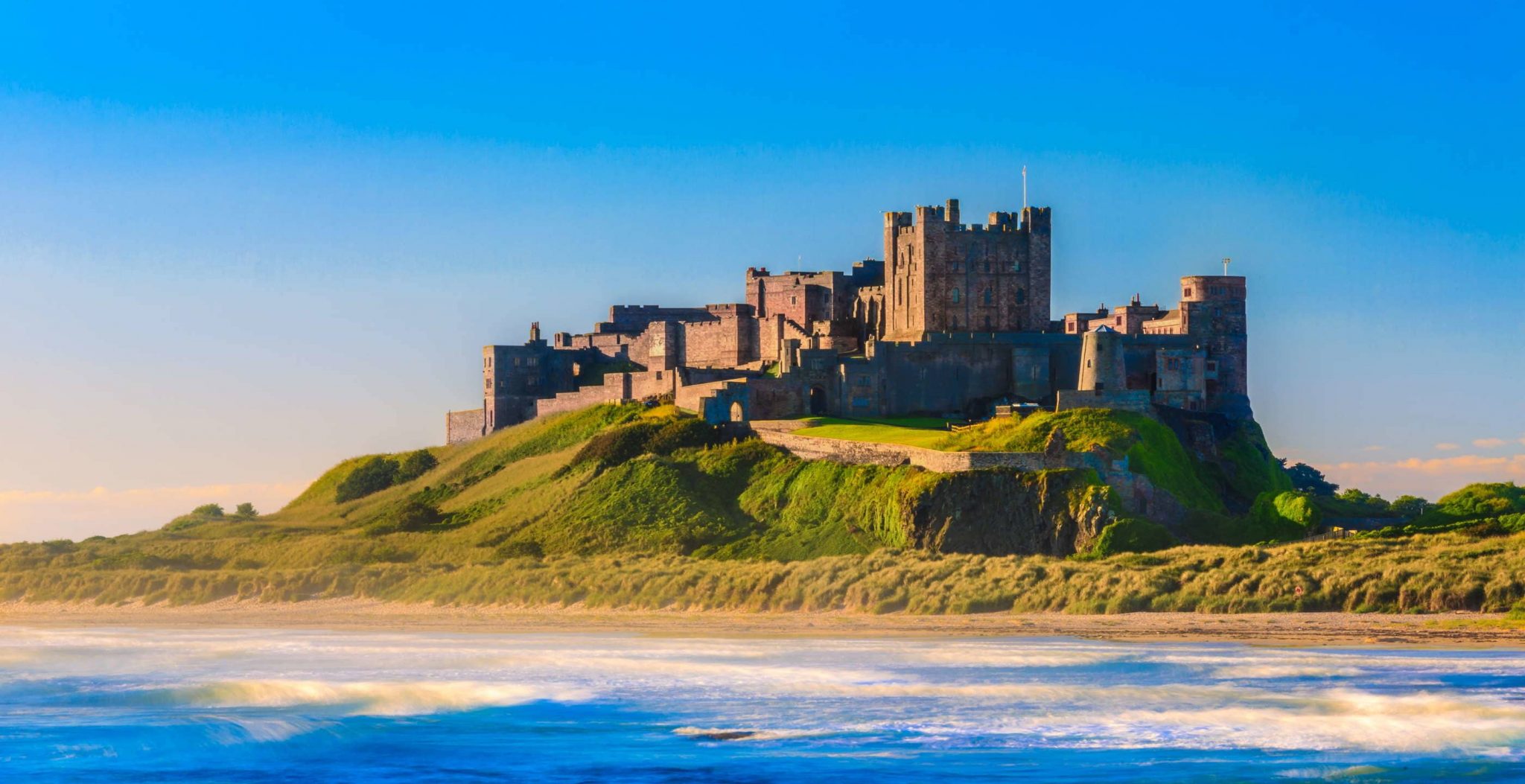 Which El Cid film scene(s) is Bamburgh Castle featured? When does it